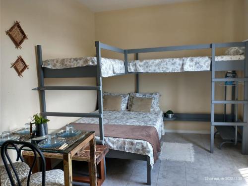 Ένα ή περισσότερα κρεβάτια σε δωμάτιο στο Apartamentos Capri Beach House Residencial Familiar