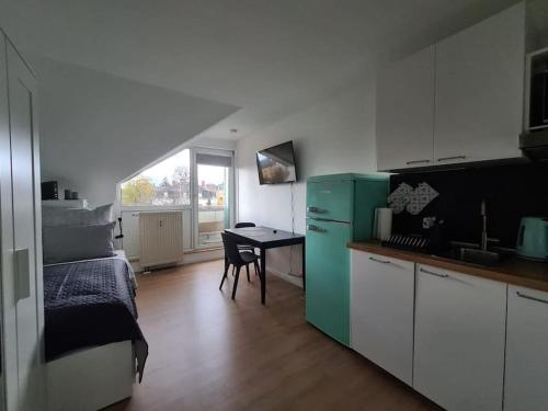 مطبخ أو مطبخ صغير في modernes Apartment in Dresden Coschütz