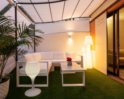 a living room with a couch and a table at The Terraces Luxury Penthouses, 1D in Santa Cruz de Tenerife