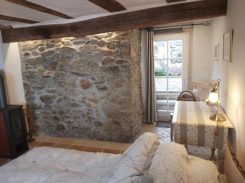 Postel nebo postele na pokoji v ubytování Charmanter Fachwerktraum an der Stadtmauer