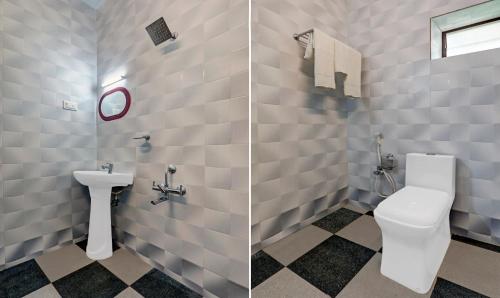a bathroom with a toilet and a sink at Itsy Hotels Regalia Grand, 500 Mtrs From Madikeri Fort in Madikeri
