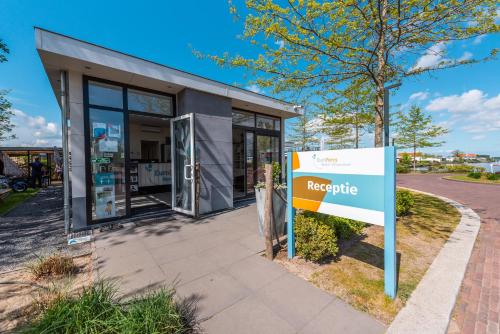 a referrite sign in front of a building at EuroParcs Veluwemeer in Nunspeet