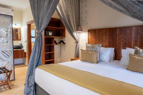 Voodi või voodid majutusasutuse Shongwe Oasis toas