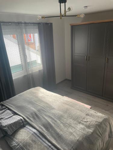 Ένα ή περισσότερα κρεβάτια σε δωμάτιο στο Premium Home 23