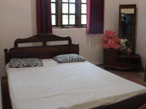 Cama o camas de una habitación en Holiday Home Anuradapura