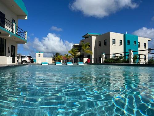  Hillsboro Suites & Residences Condo Hotel, St Kitts -  Room  picture :   Tea/Coffee maker    TV    Air conditioning                           