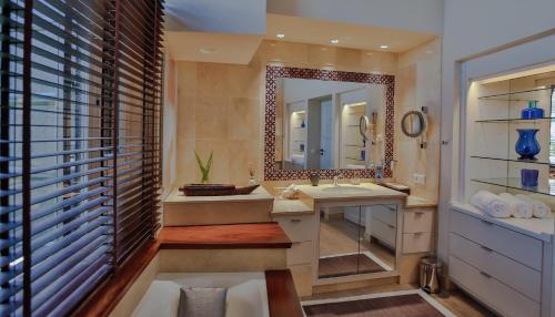 A bathroom at Amazing Ibiza Villa Can Icarus 6 Bedrooms Perched On a Cliff Overlooking the Beach of Cala Moli San Jose