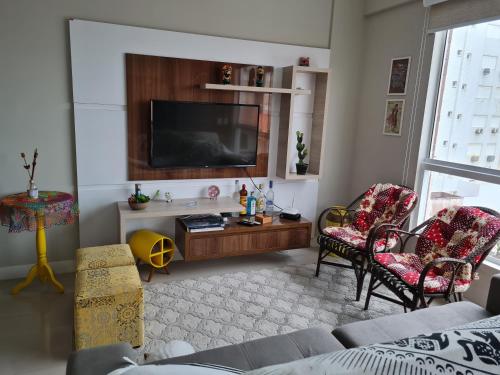 Posezení v ubytování Vista parcial para o mar