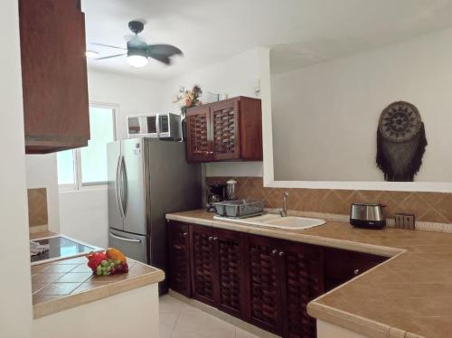 Una cocina o zona de cocina en Condo Yalku - Private access to Lagoon