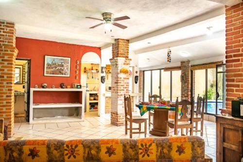 a living room with a couch and a table at Casa Madero in Oacalco