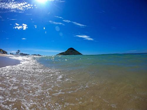 a view of the ocean on a beach at Longboard Paradise Surf Club in Rio de Janeiro