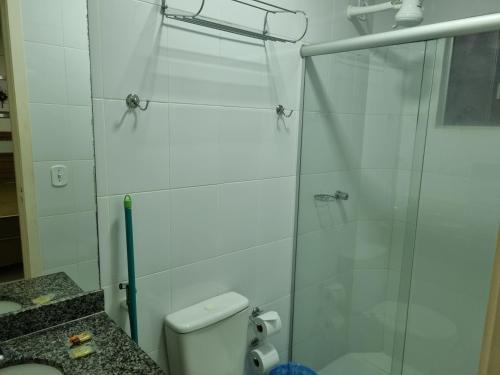 a bathroom with a glass shower with a toilet at Lacqua Diroma Parque - I - II -III - IV - V in Caldas Novas