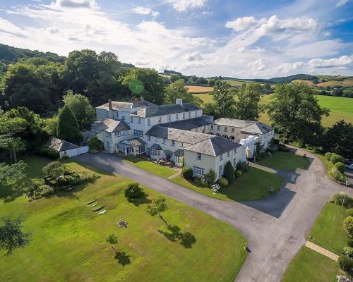 an aerial view of a large house with a yard at Best Western Lord Haldon Hotel in Exeter