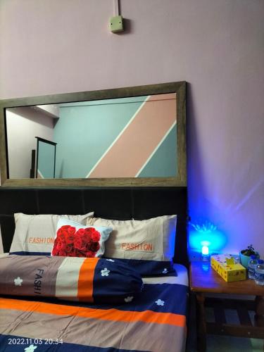 Ένα ή περισσότερα κρεβάτια σε δωμάτιο στο Yuyu homestay