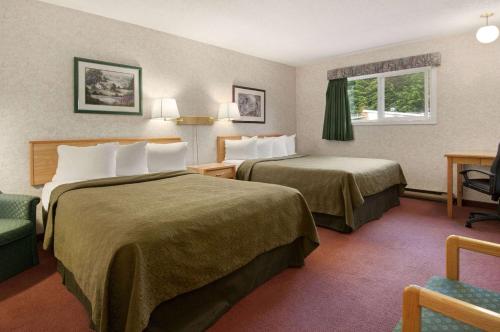 Postel nebo postele na pokoji v ubytování Travelodge by Wyndham Hope