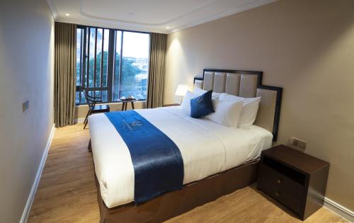 Millennium Hue Hotelにあるベッド