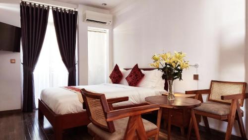 Posezení v ubytování Sok Hotel And Coffee Siem Reap