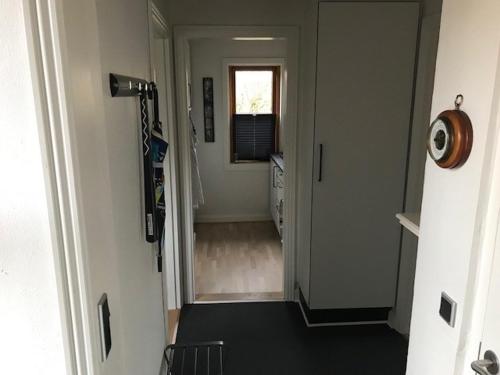 a hallway leading to a room with a hallway at Ikast Bed & Kitchen in Ikast