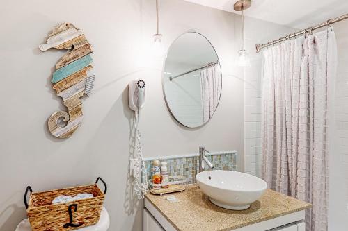 a bathroom with a sink and a mirror at Elation #5416 - Baytowne Breeze in Destin