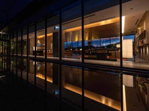 a view of a building at night at THE BLOSSOM KUMAMOTO in Kumamoto