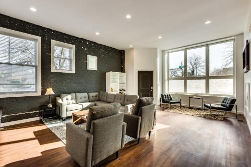 a living room with a couch and chairs at Converted Store Front Home Lets You Live Like a Local in the Heart of it All! condo in Chicago