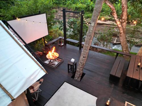 an overhead view of a fire pit on a deck at S.House168 in Chiang Mai