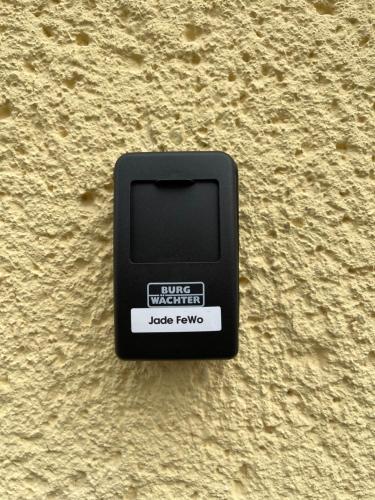 a black box on the side of a wall at Jade FeWo Cottbus in Cottbus