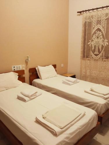 Cama o camas de una habitación en Koukonas