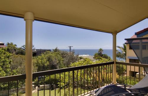 a balcony with a view of the ocean at Sunseeker Holiday Apartments in Sunshine Beach