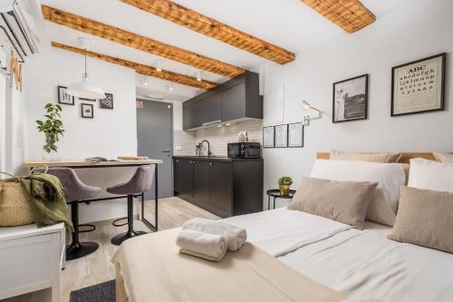 Un ou plusieurs lits dans un hébergement de l'établissement Grota apartment in the center 2