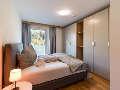 מיטה או מיטות בחדר ב-Eastside by Apartment Managers