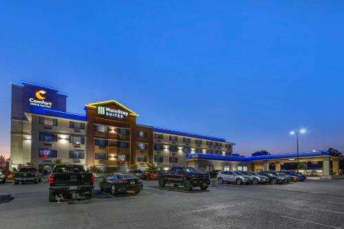 a large hotel with cars parked in a parking lot at Comfort Inn & Suites Coeur d'Alene in Coeur d'Alene