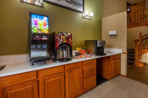 A kitchen or kitchenette at Super 8 by Wyndham Berlin WI