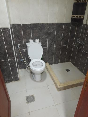 A bathroom at Farah Plaza Hostel &Hotel Apartments