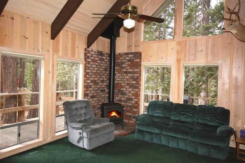 a living room with a couch and a fireplace at 0665 Yucatan in South Lake Tahoe