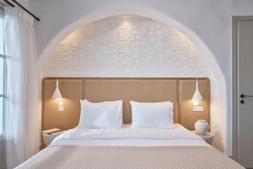 Postel nebo postele na pokoji v ubytování GrandeMar Suites