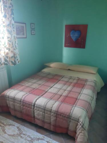 Ένα ή περισσότερα κρεβάτια σε δωμάτιο στο Agriturismo Cantinaccia di Sopra