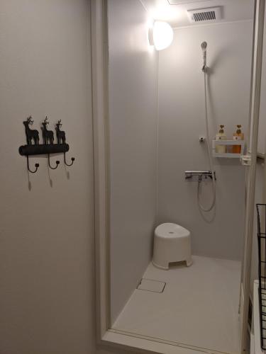 Ένα μπάνιο στο GUEST HOUSE ZU-THONES HAKUBA