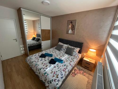 Voodi või voodid majutusasutuse Apartman Enjoy toas