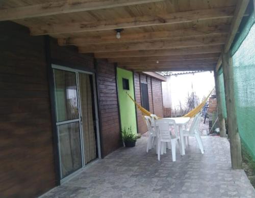 Patio nebo venkovní prostory v ubytování Cabaña OHANA ALVORADA -BARRA CHUY BRASIL