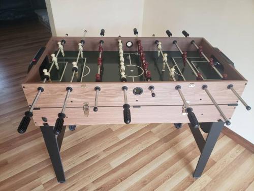 a wooden box filled with different kinds of music instruments at Cheerful Pocono home away from home in Albrightsville