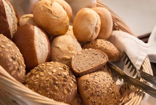 a basket filled with lots of different types of bread at Hotel Goldenes Lamm in Idstein