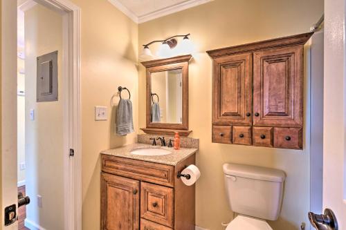 a bathroom with a sink and a toilet at Convenient PCB Condo with Pool Access Walk to Beach in Panama City Beach