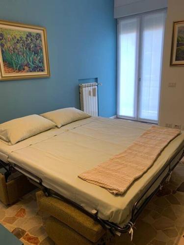 Posteľ alebo postele v izbe v ubytovaní Cozy 1-room Studio in Giambellino