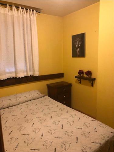 מיטה או מיטות בחדר ב-CHECK IN CASAS Casa Elson