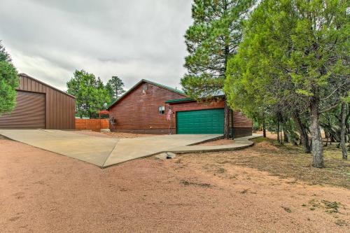 a skateboard ramp in front of a barn at Fire Pit, Fenced Yard Overgaard Cabin Near Hiking in Overgaard