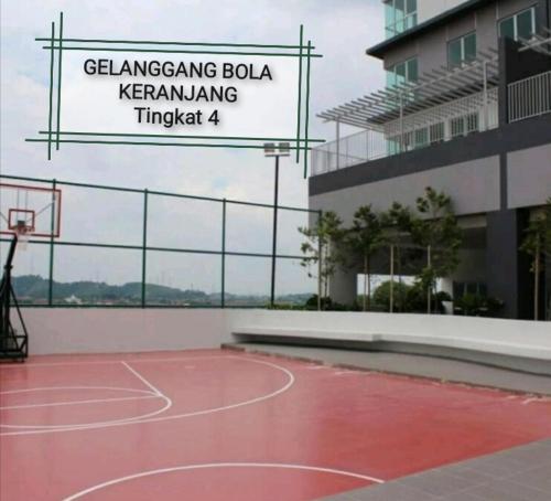 a basketball court in front of a building at Azin Ramli Studio in Seri Kembangan