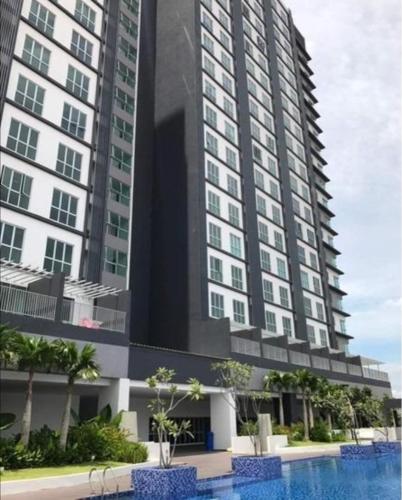 a rendering of a tall building with a swimming pool at Azin Ramli Studio in Seri Kembangan