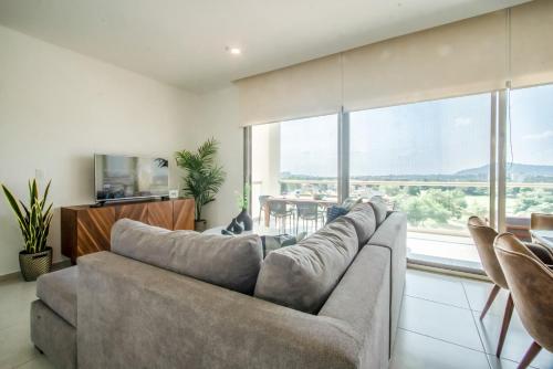 Posezení v ubytování Departamento en Paraiso Country Club - Amenidades de lujo