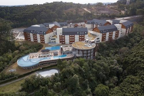 an aerial view of a resort with a swimming pool at Golden Gramado Lagueto Resort in Gramado